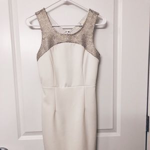 Sheath white dress with open back and gold detail